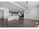 This dining area features wood floors and a modern light fixture at 4211 E Desert Vista Trl, Cave Creek, AZ 85331