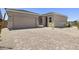 Charming home showcasing a lovely paver driveway leading to an attached two-car garage at 4211 E Desert Vista Trl, Cave Creek, AZ 85331