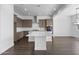 Modern kitchen showcasing a center island with seating and stainless steel appliances at 4211 E Desert Vista Trl, Cave Creek, AZ 85331