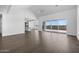 Open-concept living room with high ceilings and a sliding glass door to the outside at 4211 E Desert Vista Trl, Cave Creek, AZ 85331