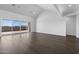 Spacious living room featuring a sliding glass door and light hardwood floors at 4211 E Desert Vista Trl, Cave Creek, AZ 85331