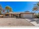 Charming single-story home featuring a two-car garage, desert landscaping and mature trees at 4533 S Terrace Rd, Tempe, AZ 85282