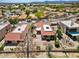 Aerial view showcases red tile roofs, desert landscaping, and a charming neighborhood layout at 4538 E Shomi St, Phoenix, AZ 85044