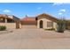 Charming single-story home with a red tile roof, desert landscaping, and an attached two-car garage at 4538 E Shomi St, Phoenix, AZ 85044