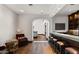 View of a basement bar area, with arched doorway and comfortable seating at 4743 N 54Th St, Phoenix, AZ 85018
