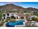 Luxury home featuring a pool, spa, and outdoor seating with mountain views at 4743 N 54Th St, Phoenix, AZ 85018