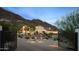 Grand estate with wrought iron gates, landscaped yard, and mountain views at 4743 N 54Th St, Phoenix, AZ 85018