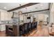 Spacious kitchen with a large island, stylish pendant lighting, and open flow to the living area at 4743 N 54Th St, Phoenix, AZ 85018