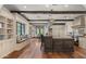 Gourmet kitchen featuring a large island, breakfast bar, and hardwood floors at 4743 N 54Th St, Phoenix, AZ 85018