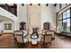 Elegant living room with a fireplace, wood floors, and exposed beam ceiling at 4743 N 54Th St, Phoenix, AZ 85018