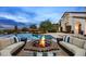 Inviting outdoor space with a pool, a brick fire pit, and comfortable seating, perfect for relaxation and entertaining at 4743 N 54Th St, Phoenix, AZ 85018