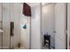 Shower features glass door, white walls, and a view of the adjacent toilet room at 5055 E Paseo Way, Phoenix, AZ 85044
