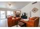 Comfortable living room features a fireplace, TV area, and seating at 5055 E Paseo Way, Phoenix, AZ 85044