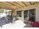 Inviting covered patio with a dining table set, perfect for outdoor entertaining and relaxation at 5055 E Paseo Way, Phoenix, AZ 85044