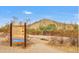 Scenic mountain trail with park regulations posted at the Pima Canyon trailhead at 5055 E Paseo Way, Phoenix, AZ 85044