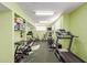 Well-equipped gym with treadmills, weight machines, and free weights for a comprehensive workout at 5518 E Lindstrom Ln # 2011, Mesa, AZ 85215