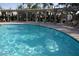 Relax and unwind by the community pool surrounded by elegant pillars and comfortable seating at 7009 E Acoma Dr # 1044, Scottsdale, AZ 85254