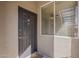 Inviting front entrance features a modern door with digital lock and large window, creating a warm and secure welcome at 7009 E Acoma Dr # 1044, Scottsdale, AZ 85254