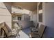 Cozy covered patio with comfortable chairs, offering an inviting outdoor space at 7009 E Acoma Dr # 1044, Scottsdale, AZ 85254