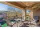Balcony featuring outdoor furniture, a patterned carpet, and serene views of the lake at 705 W Queen Creek Rd # 2158, Chandler, AZ 85248
