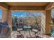 Inviting balcony featuring a cozy seating area and scenic waterfront views at 705 W Queen Creek Rd # 2158, Chandler, AZ 85248