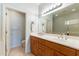 Bathroom with double sinks, spacious vanity, and a separate toilet room for privacy at 705 W Queen Creek Rd # 2158, Chandler, AZ 85248