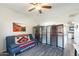 Multi-purpose room features a futon and privacy screen at 705 W Queen Creek Rd # 2158, Chandler, AZ 85248