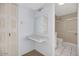 Bathroom features a granite vanity and updated shower with glass doors for a sleek, modern look at 7607 N 22Nd Pl, Phoenix, AZ 85020