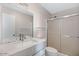 Bathroom with a white vanity and a glass-enclosed shower at 7607 N 22Nd Pl, Phoenix, AZ 85020