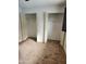 Bedroom closets with neutral carpet and ample storage space, perfect for organization at 7607 N 22Nd Pl, Phoenix, AZ 85020