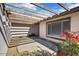 Home exterior featuring a decorative wood pergola over a concrete patio at 7607 N 22Nd Pl, Phoenix, AZ 85020