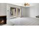 Spacious living room with sliding glass doors leading to an outdoor pool area at 7607 N 22Nd Pl, Phoenix, AZ 85020
