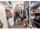 This walk-in closet provides ample storage space with shelves, hanging rods, and room for organizing personal belongings at 8430 W Atlantis Way, Tolleson, AZ 85353