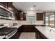 Beautiful kitchen featuring stainless steel appliances, countertops, and ample cabinet space at 8430 W Atlantis Way, Tolleson, AZ 85353