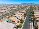 Extensive community featuring beautiful homes with tile roofs, well-planned streets, and mountain views in the distance at 10024 E Tamery Ave, Mesa, AZ 85212