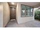 Inviting entrance featuring a stylish front door, natural light, and brick-paved walkway at 10024 E Tamery Ave, Mesa, AZ 85212