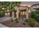 Inviting single-story home with a covered porch and desert landscaping at 10024 E Tamery Ave, Mesa, AZ 85212