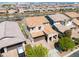 Stunning two-story home with a tile roof, a two-car garage, and lush greenery in a suburban setting at 10024 E Tamery Ave, Mesa, AZ 85212