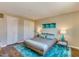 Serene bedroom with stylish decor, a minimalist bed frame, and ample closet space at 1005 E 8Th St # 3017, Tempe, AZ 85281