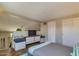 Unique loft bedroom with a cozy seating area, neutral colors, and ample closet space at 1005 E 8Th St # 3017, Tempe, AZ 85281