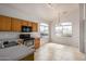 Well-lit kitchen with stainless steel appliances, tile floor and a breakfast nook at 11040 W Hayward Ave, Glendale, AZ 85307