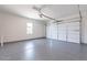 Clean and spacious two-car garage with sealed floor and automatic door opener at 11188 N Blakely St, Surprise, AZ 85388