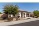 Inviting single-story home with a neat front yard and an attached two-car garage at 11915 S 184Th Ave, Goodyear, AZ 85338