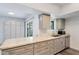 Contemporary kitchen featuring stainless steel appliances, stone countertops, and ample cabinet space at 13620 N Hawthorn Dr, Sun City, AZ 85351