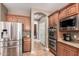 Kitchen showcasing stainless steel appliances and updated cabinetry with ample space at 15322 W Montecito Ave, Goodyear, AZ 85395