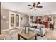 Inviting living room flows into the kitchen with stylish decor and natural light at 15322 W Montecito Ave, Goodyear, AZ 85395