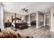 A spacious main bedroom featuring a four-poster bed and sitting area is ideal for relaxation at 15322 W Montecito Ave, Goodyear, AZ 85395