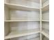 Walk-in closet with built-in shelves at 15881 W Berkeley Rd, Goodyear, AZ 85395