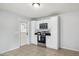 Kitchen featuring all white cabinets, stainless steel appliances, and tile flooring at 1747 W Belfast St, Mesa, AZ 85201