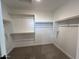 A spacious walk-in closet with shelving provides ample storage for clothes and accessories at 17541 W Lupine Ave, Goodyear, AZ 85338